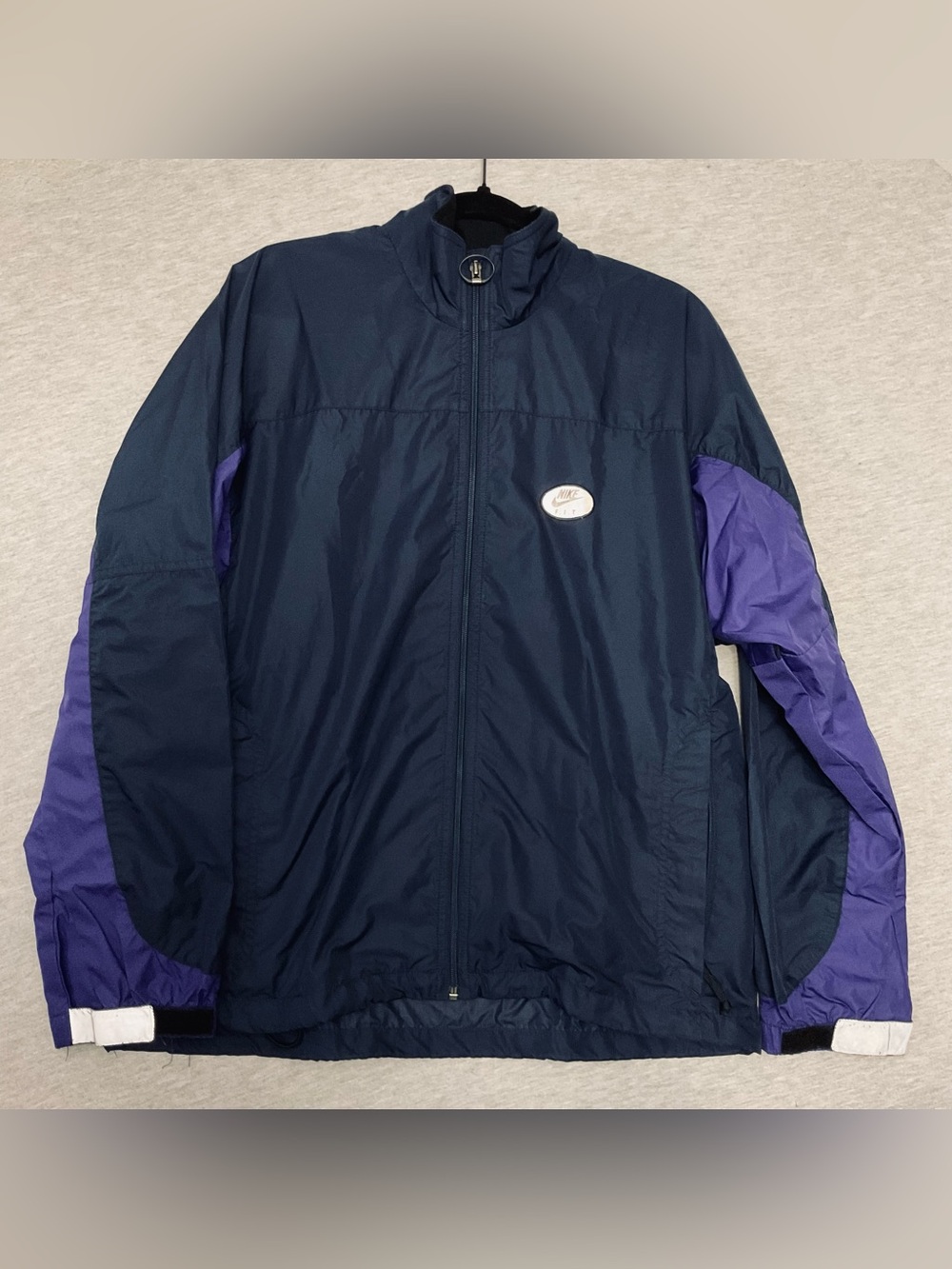 Nike Navy Windbreaker with Purple Sleeve Accents